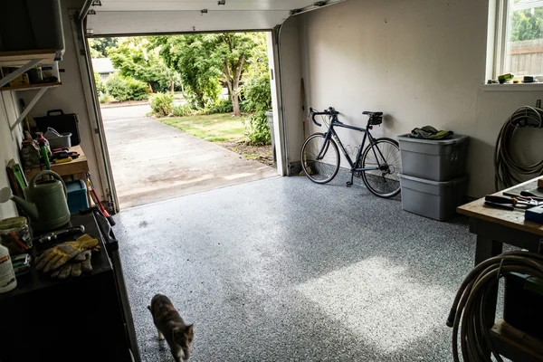 Gray and white flake epoxy garage floor finished in a Eugene home