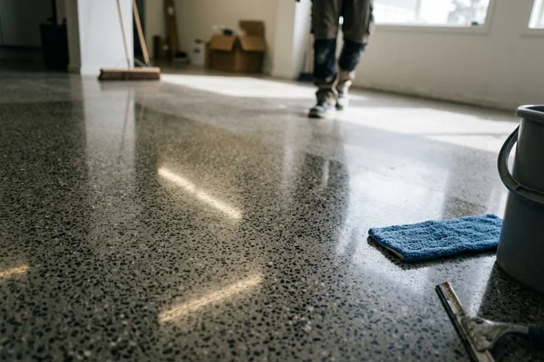 Salt-and-pepper polished concrete close-up with fine exposed aggregate