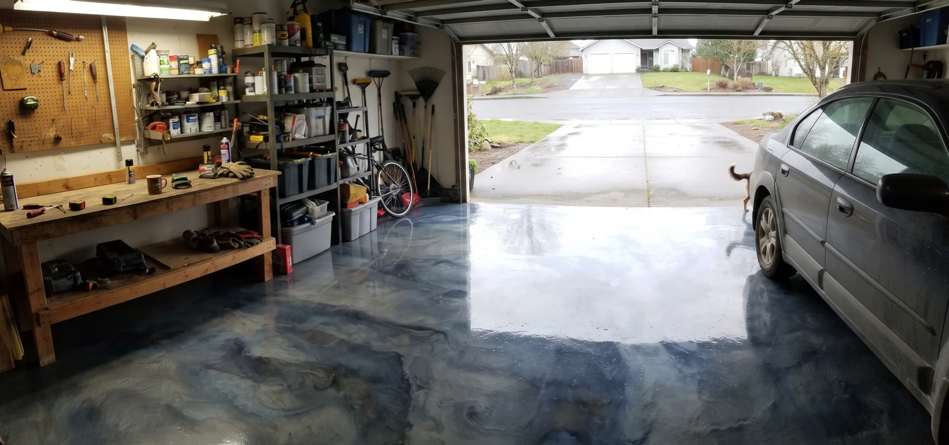 Finished high-gloss metallic epoxy garage floor in a Eugene, Oregon home